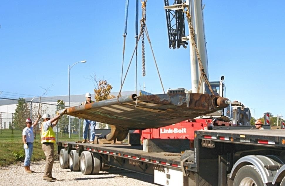 Upper half of the rudder with yoke attached arrives in Omaha (2012)